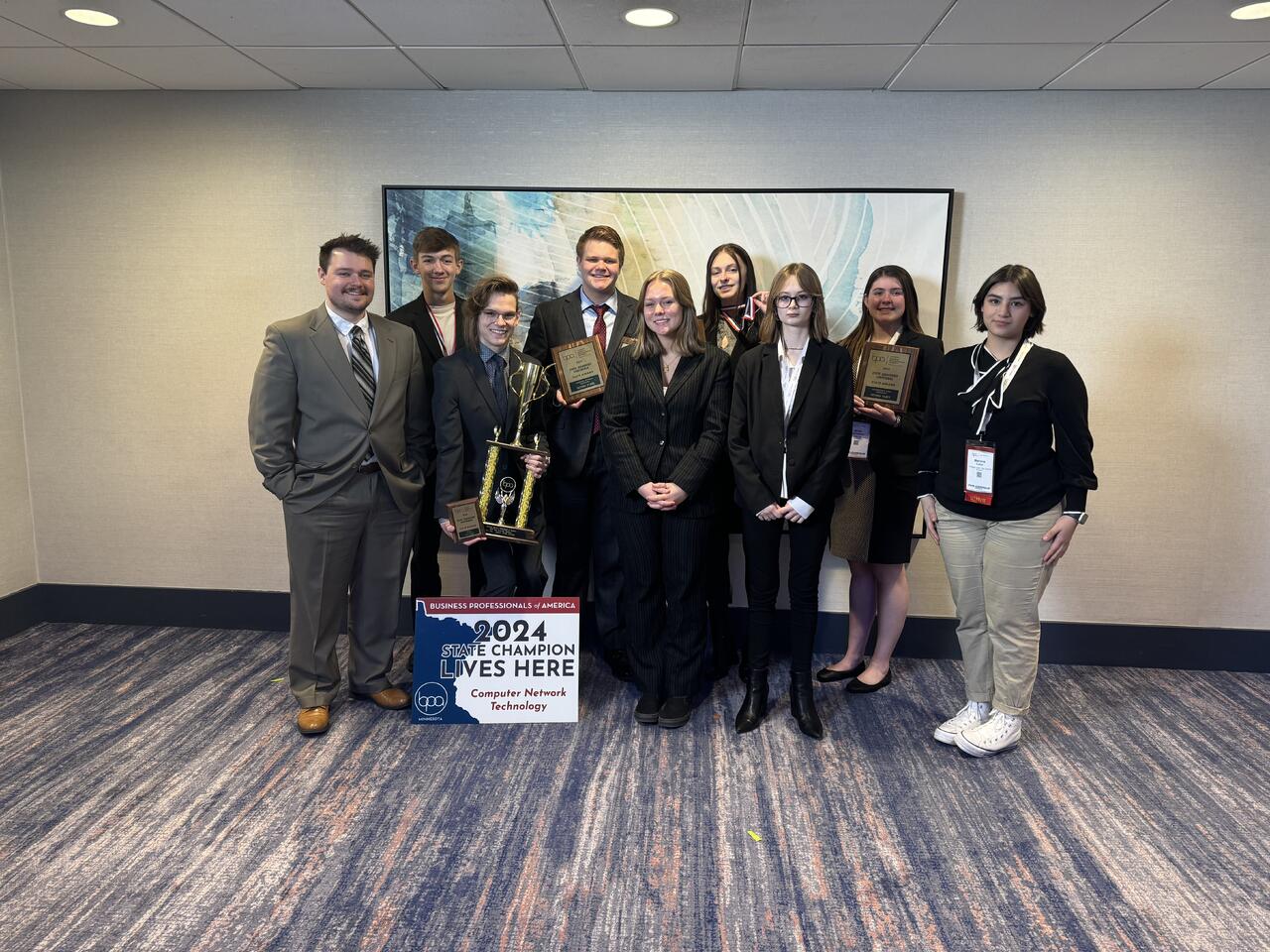 Caleb J. Carlson receiving a networking and systems award
